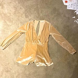 Sz medium, 96% polyester 12% spandex, beige romper